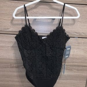 Brand new black body suit